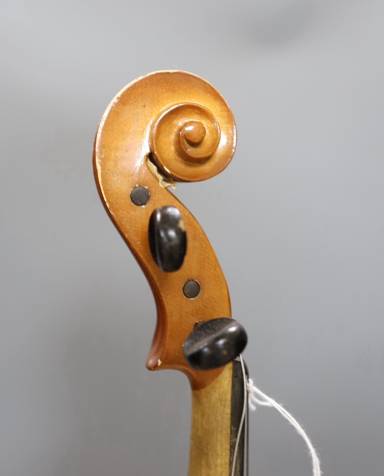 A cased 20th century Romanian violin, back measures 35.5cm excl button